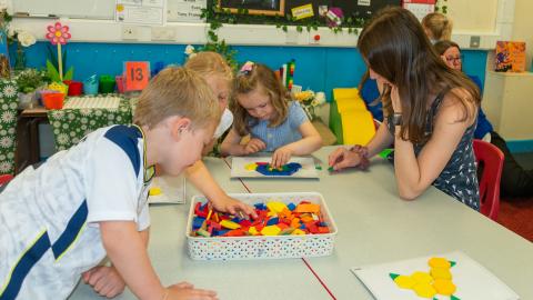 Early years pupils looking learning about shapes 
